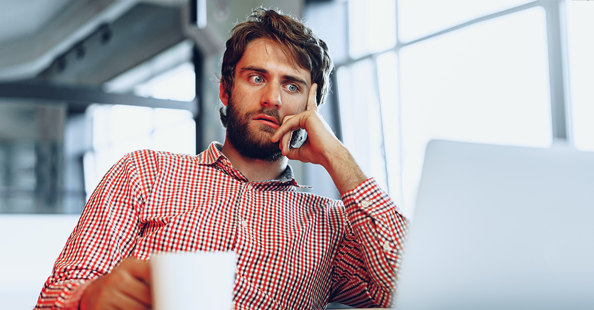 Man who is frustrated at computer